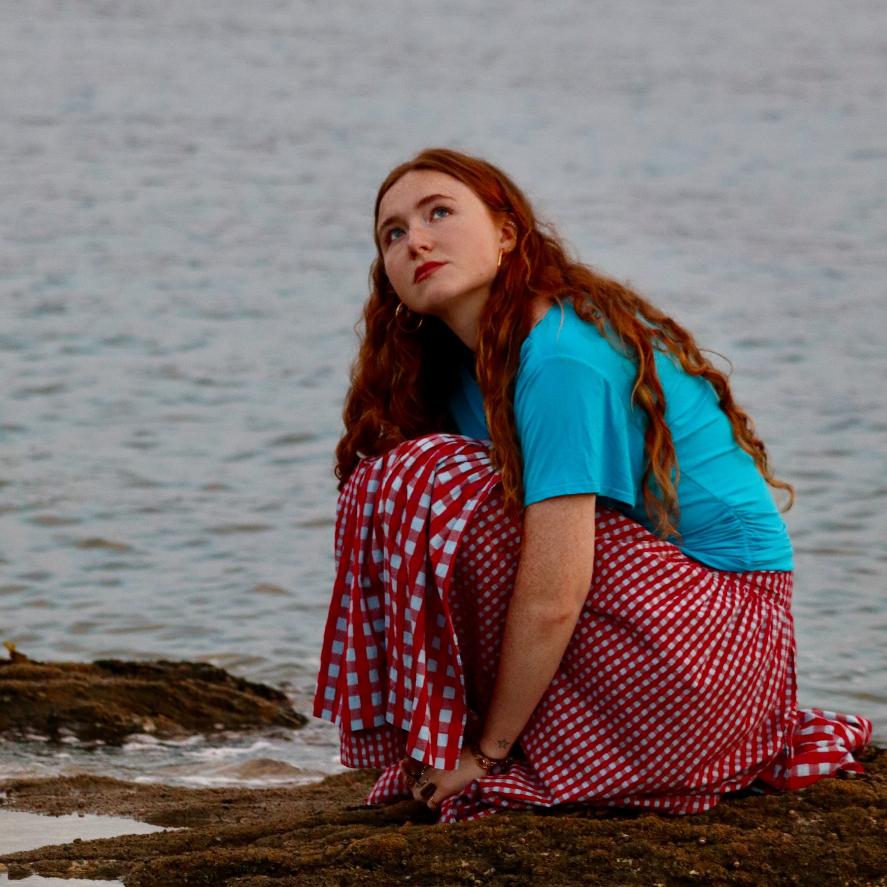 Georgie Benz at dusk by the water